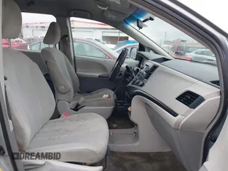 2012 Toyota Sienna with VIN 5TDZK3DC2CS221981, listed as a IAAI auction lot 41650273 with 146,652 mi miles. Bid and sale history available at carsss.com. Image 5.