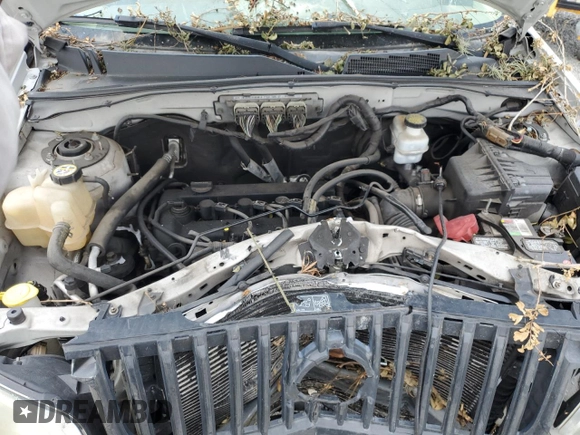 2009 Mercury Mariner Premier с VIN 4M2CU87709KJ14823, выставлен на аукционе Copart как лот 60121965 с пробегом Не указан миль и Списание • Salvage title. История ставок и продаж доступна на DreamBid. Изображение 12.