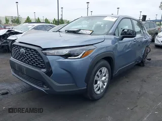 2024 Toyota Corolla Cross L with VIN 7MUAAAAG4RV106731, listed as a IAAI auction lot 42373872 with 13,065 mi miles and . Bid and sale history available at DreamBid. Image 2.