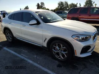 2020 BMW X4 xDrive30i with VIN 5UX2V1C09L9B97540, listed as a Copart auction lot 73984983 with 64,343 mi miles. Bid and sale history available at carsss.com. Image 4.