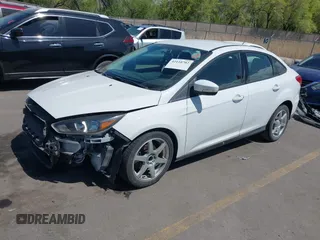 2017 Ford Focus SE with VIN 1FADP3F24HL232527, listed as a IAAI auction lot 42110702 with 95,327 mi miles and . Bid and sale history available at DreamBid. Image 18.