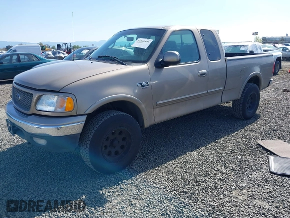 2001 Ford F-150 XL z VIN 1FTRX18WX1NA13022, wystawiony jako IAAI lot #41954491 z przebiegiem 126 284 mil mil oraz . Historia ofert i sprzedaży dostępna na DreamBid. Obrazek 2.