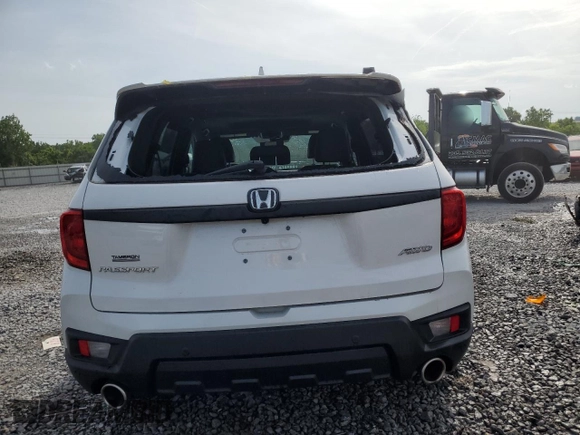 2023 Honda Passport EX-L with VIN 5FNYF8H58PB024039, listed as a Copart auction lot 57269725 with 44,705 mi miles and Salvage title. Bid and sale history available at DreamBid. Image 6.