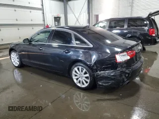 2015 Audi A6 2.0T Premium with VIN WAUFFAFC9FN032258, listed as a Copart auction lot 70641064 with 125,355 mi miles and Salvage Title. Bid and sale history available at carsss.com. Image 2.