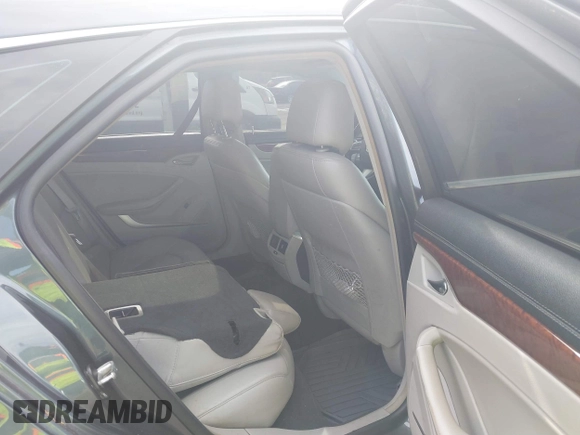 2012 Cadillac CTS with VIN 1G6DG8E58C0125786, listed as a IAAI auction lot 41755749 with 167,363 mi miles and . Bid and sale history available at DreamBid. Image 8.