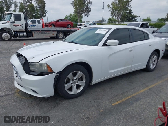2014 Dodge Charger SE with VIN 2C3CDXBG3EH131242, listed as a IAAI auction lot 42121260 with 231,452 mi miles and . Bid and sale history available at DreamBid. Image 2.