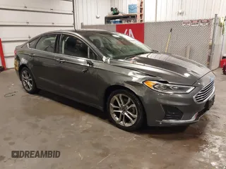 2020 Ford Fusion SEL z VIN 3FA6P0CDXLR118121, wystawiony jako IAAI lot #42358225 z przebiegiem 85 606 mil mil oraz . Historia ofert i sprzedaży dostępna na DreamBid. Obrazek 1.