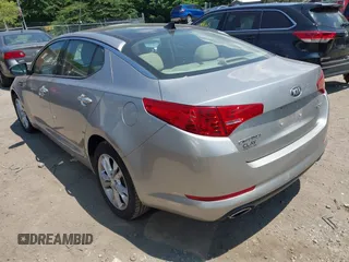 2013 Kia Optima EX with VIN 5XXGN4A79DG133492, listed as a IAAI auction lot 42742932 with 85,179 mi miles and . Bid and sale history available at DreamBid. Image 3.