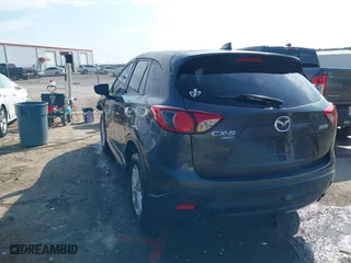 2016 Mazda CX-5 Touring with VIN JM3KE4CY3G0672977, listed as a IAAI auction lot 41889137 with 130,593 mi miles. Bid and sale history available at carsss.com. Image 3.