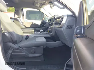 2023 Ford F-150 Lightning Pro with VIN 1FTVW1EL6PWG34059, listed as a IAAI auction lot 42010900 with 20,759 mi miles and . Bid and sale history available at DreamBid. Image 5.