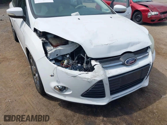 2014 Ford Focus SE with VIN 1FADP3K25EL251024, listed as a IAAI auction lot 42123157 with 74,311 mi miles and . Bid and sale history available at carsss.com. Image 6.
