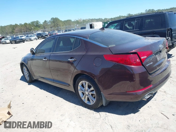 2012 Kia Optima EX with VIN 5XXGN4A73CG071036, listed as a IAAI auction lot 41849926 with 147,448 mi miles. Bid and sale history available at carsss.com. Image 3.