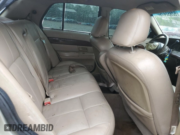 2003 Mercury Grand Marquis GS Convenience z VIN 2MEFM74W53X702387, wystawiony jako Copart lot #52852475 z przebiegiem 246 543 mil mil oraz Szkoda całkowita • Salvage title. Historia ofert i sprzedaży dostępna na DreamBid. Obrazek 10.