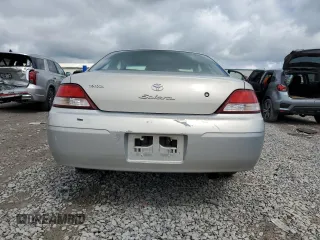 2000 Toyota Solara SE z VIN 2T1CG22P4YC340204, wystawiony jako Copart lot #56932265 z przebiegiem 168 041 mil mil oraz Czysty tytuł • Clean title. Historia ofert i sprzedaży dostępna na DreamBid. Obrazek 6.