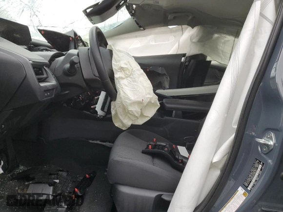 2024 Toyota Prius LE z VIN JTDACAAU6R3026309, wystawiony jako Copart lot #52873725 z przebiegiem 19 520 mil mil oraz Nie do naprawy • Non repairable. Historia ofert i sprzedaży dostępna na DreamBid. Obrazek 7.