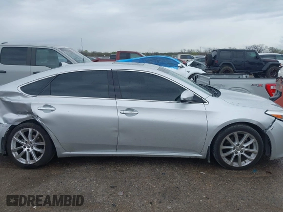 2013 Toyota Avalon XLE z VIN 4T1BK1EB2DU044501, wystawiony jako IAAI lot #41905442 z przebiegiem 97 169 mil mil oraz . Historia ofert i sprzedaży dostępna na DreamBid. Obrazek 13.