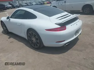 2015 Porsche 911 Carrera z VIN WP0AA2A90FS100123, wystawiony jako IAAI lot #42339229 z przebiegiem 135 198 mil mil oraz . Historia ofert i sprzedaży dostępna na DreamBid. Obrazek 3.