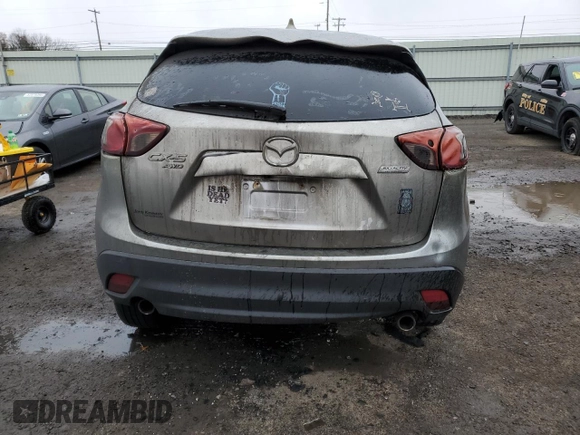 2015 Mazda CX-5 Grand Touring with VIN JM3KE4DY6F0528286, listed as a Copart auction lot 52367765 with Not Provided miles and Salvage Title. Bid and sale history available at DreamBid. Image 6.