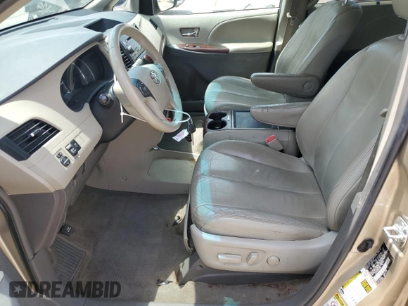 2012 Toyota Sienna XLE AAS with VIN 5TDYK3DC1CS277339, listed as a Copart auction lot 57494715 with 240,666 mi miles and Salvage title. Bid and sale history available at DreamBid. Image 7.