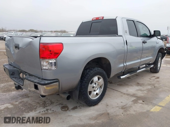 2012 Toyota Tundra z VIN 5TFRY5F18CX121917, wystawiony jako IAAI lot #41475681 z przebiegiem 166 507 mil mil oraz . Historia ofert i sprzedaży dostępna na DreamBid. Obrazek 4.