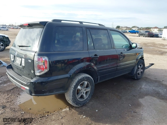 2007 Honda Pilot EX-L with VIN 5FNYF28557B027087, listed as a IAAI auction lot 41356244 with 183,923 mi miles. Bid and sale history available at carsss.com. Image 4.