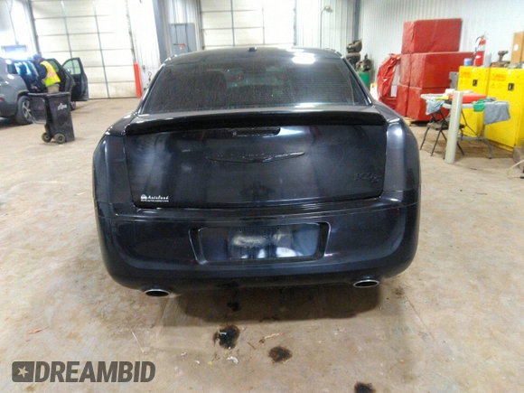 2014 Chrysler 300 S with VIN 2C3CCABG2EH343503, listed as a IAAI auction lot 40934463 with 128,876 mi miles and . Bid and sale history available at carsss.com. Image 16.