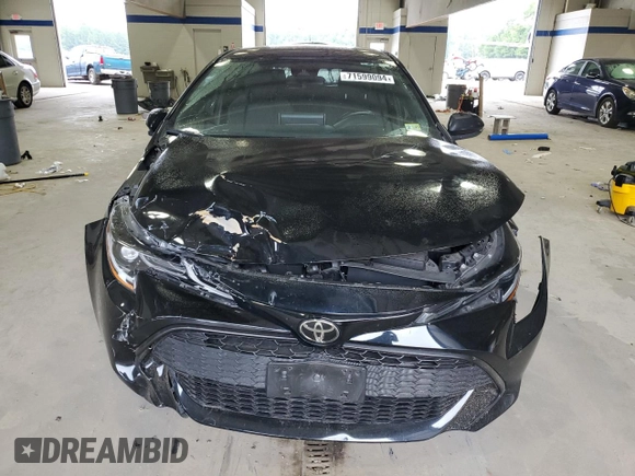 2021 Toyota Corolla Hatchback SE with VIN JTND4MBE9M3135094, listed as a Copart auction lot 71599094 with 51,063 mi miles and Salvage Title. Bid and sale history available at carsss.com. Image 5.