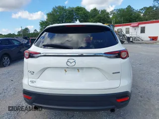 2022 Mazda CX-9 Touring z VIN JM3TCBCY7N0600787, wystawiony jako IAAI lot #42240512 z przebiegiem 27 927 mil mil oraz . Historia ofert i sprzedaży dostępna na DreamBid. Obrazek 16.