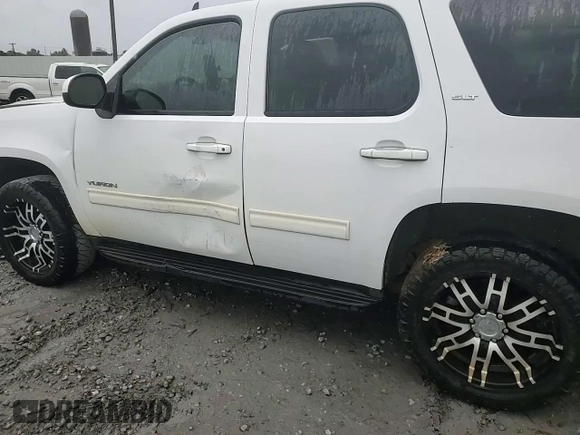 2011 GMC Yukon SLT with VIN 1GKS1CE09BR154032, listed as a Copart auction lot 69023864 with 246,494 mi miles and Salvage Title. Bid and sale history available at carsss.com. Image 11.