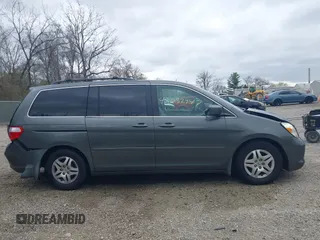2007 Honda Odyssey EX-L with VIN 5FNRL38767B406636, listed as a IAAI auction lot 42032947 with 228,139 mi miles and . Bid and sale history available at carsss.com. Image 13.