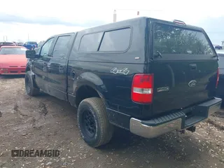 2004 Ford F-150 XLT with VIN 1FTRW14W04KC68874, listed as a IAAI auction lot 42159087 with 134,141 mi miles. Bid and sale history available at carsss.com. Image 3.