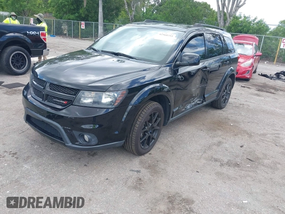 2016 Dodge Journey R/T with VIN 3C4PDCEG0GT226398, listed as a IAAI auction lot 42560255 with 127,498 mi miles and . Bid and sale history available at DreamBid. Image 2.