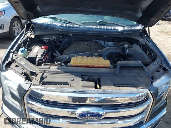 2015 Ford F-150 XL with VIN 1FTEW1CGXFFA33502, listed as a IAAI auction lot 41833755 with 128,475 mi miles. Bid and sale history available at carsss.com. Image 10.