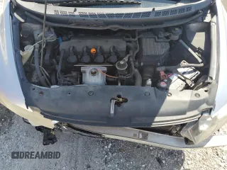2010 Honda Civic LX with VIN 19XFA1F51AE016877, listed as a Copart auction lot 52275475 with 217,152 mi miles and Salvage Title. Bid and sale history available at DreamBid. Image 12.