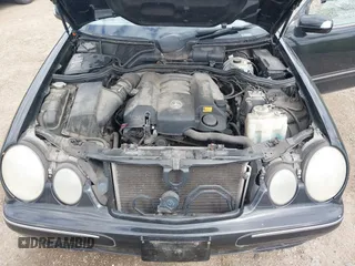 2002 Mercedes-Benz E-Class with VIN WDBJF65J52B496832, listed as a IAAI auction lot 42202331 with 156,304 mi miles. Bid and sale history available at carsss.com. Image 10.