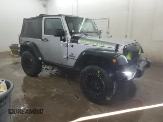 2013 Jeep Wrangler Sport with VIN 1C4AJWAG5DL591897, listed as a Copart auction lot 63218025 with 81,250 mi miles and Clean title. Bid and sale history available at DreamBid. Image 4.