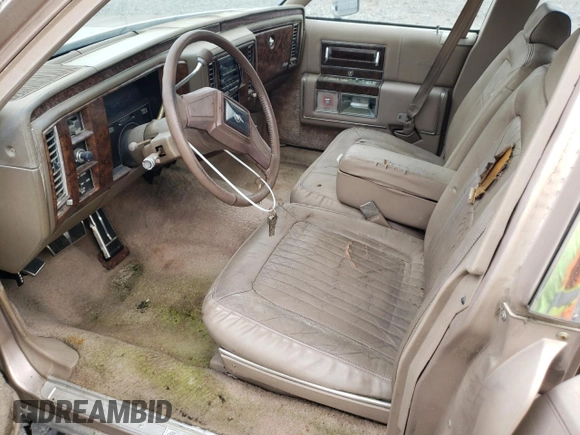 1992 Cadillac Brougham z VIN 1G6DW5479NR710170, wystawiony jako Copart lot #70194164 z przebiegiem Nie podano mil oraz Nie do naprawy • Non repairable. Historia ofert i sprzedaży dostępna na DreamBid. Obrazek 7.