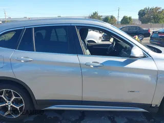 2017 BMW X1 xDrive28i z VIN WBXHT3Z34H4A53805, wystawiony jako IAAI lot #40682476 z przebiegiem 225 253 mil mil oraz . Historia ofert i sprzedaży dostępna na DreamBid. Obrazek 13.