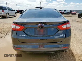 2013 Ford Fusion SE Hybrid with VIN 3FA6P0LU0DR267560, listed as a Copart auction lot 60563415 with 140,998 mi miles and Clean title. Bid and sale history available at DreamBid. Image 6.