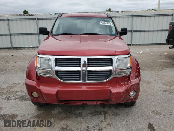 2007 Dodge Nitro SXT with VIN 1D8GU28K57W662816, listed as a Copart auction lot 56965655 with 182,614 mi miles and Salvage title. Bid and sale history available at DreamBid. Image 5.