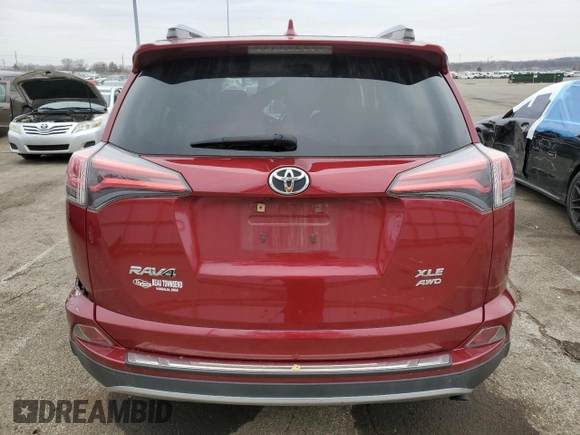 2018 Toyota RAV4 XLE with VIN JTMRFREV6JD233356, listed as a Copart auction lot 44265935 with 76,226 mi miles and Salvage Title. Bid and sale history available at DreamBid. Image 6.