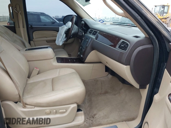 2014 GMC Yukon XL Denali with VIN 1GKS2MEF8ER239777, listed as a IAAI auction lot 41192009 with 142,656 mi miles. Bid and sale history available at carsss.com. Image 5.