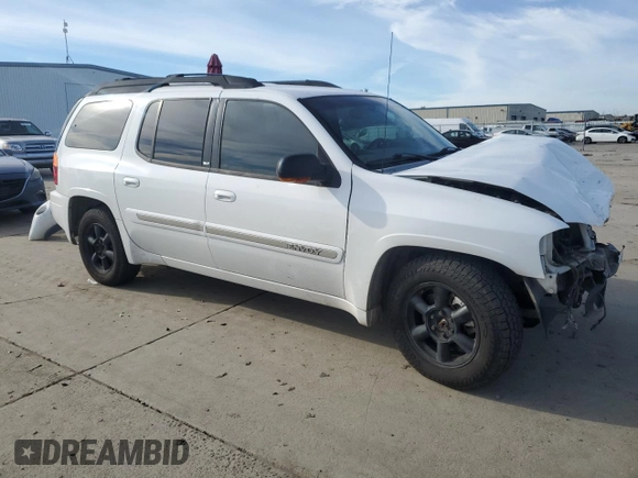 2003 GMC Envoy XL SLE with VIN 1GKET16S532130221, listed as a Copart auction lot 87108784 with 217,821 mi miles and Salvage Title. Bid and sale history available at carsss.com. Image 4.
