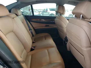 2013 BMW 7 Series 740i with VIN WBAYA6C58DC995008, listed as a Copart auction lot 62008795 with 95,974 mi miles and Salvage title. Bid and sale history available at DreamBid. Image 10.