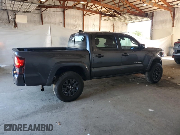 2023 Toyota Tacoma SR z VIN 3TMCZ5AN4PM599664, wystawiony jako Copart lot #57462455 z przebiegiem 65 736 mil mil oraz Szkoda całkowita • Salvage title. Historia ofert i sprzedaży dostępna na DreamBid. Obrazek 3.