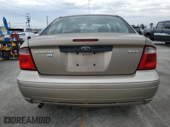 2005 Ford Focus S with VIN 1FAFP34N55W105530, listed as a Copart auction lot 59186695 with 136,204 mi miles and Salvage title. Bid and sale history available at DreamBid. Image 6.