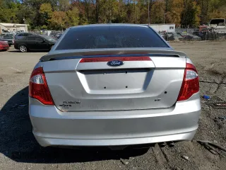 2012 Ford Fusion SE with VIN 3FAHP0HA9CR267305, listed as a Copart auction lot 77114304 with 165,781 mi miles and Salvage Title. Bid and sale history available at carsss.com. Image 6.