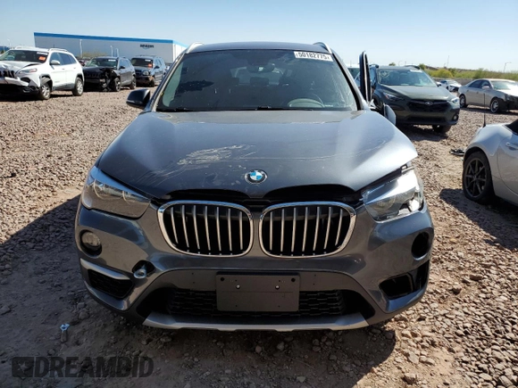 2017 BMW X1 xDrive28i with VIN WBXHT3C32H5F79403, listed as a Copart auction lot 50182775 with 71,003 mi miles and Salvage Title. Bid and sale history available at carsss.com. Image 5.