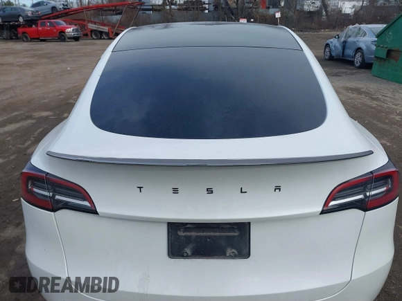 2021 Tesla Model Y Performance with VIN 5YJYGDEF1MF262930, listed as a IAAI auction lot 41606321 with 28,882 mi miles and . Bid and sale history available at DreamBid. Image 16.