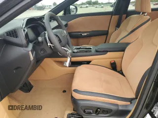 2023 Lexus RZ 450e Premium z VIN JTJAAAAB5PA017837, wystawiony jako Copart lot #62794494 z przebiegiem 4094 mil mil oraz Szkody całkowita. Historia ofert i sprzedaży dostępna na DreamBid. Obrazek 7.